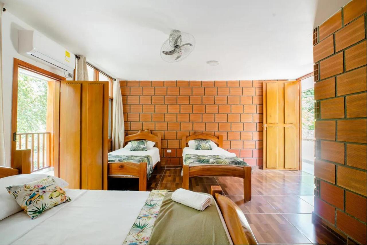Arca Tayrona Restaurant & Hostal Los Naranjos Exterior photo
